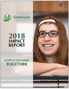 Image of young autistic adult on cover of Sinneave Family Foundation 2018 Impact Report with the words Shaping the Future Together