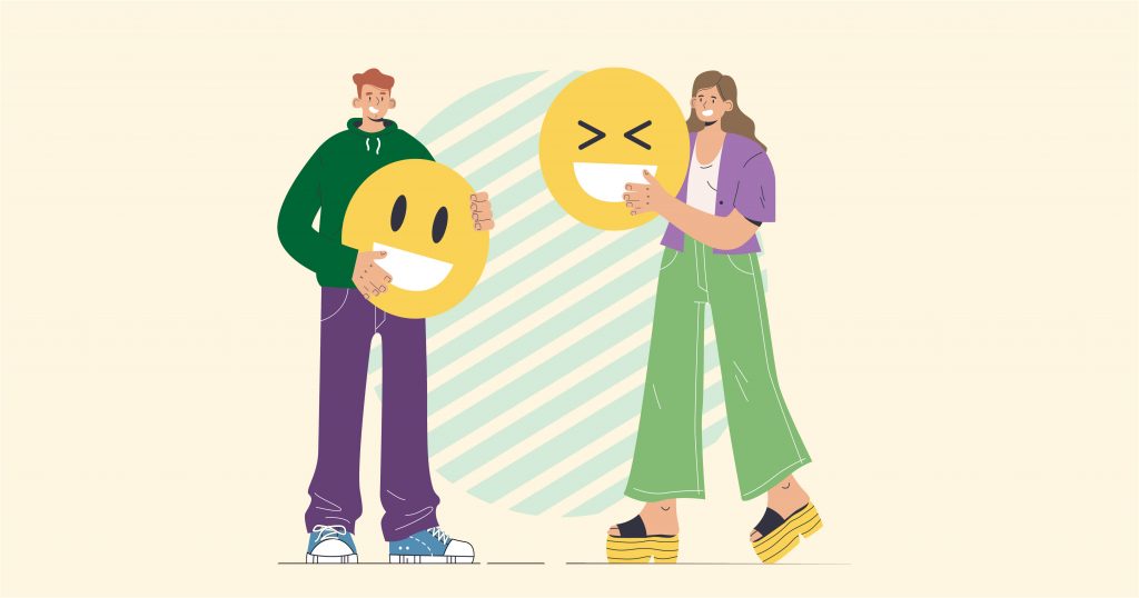 "Illustration of two people holding large, smiling emoji signs."