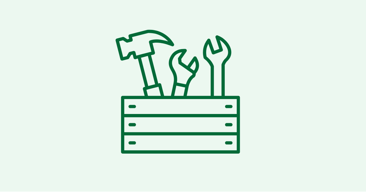An icon of a wooden toolbox with a hammer and two wrenches sticking out.